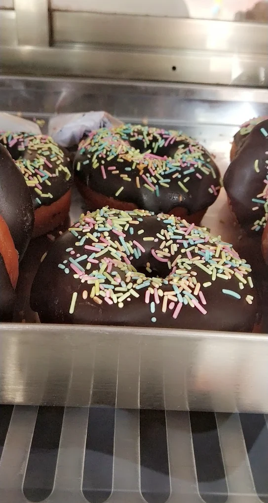 Chocolate donuts with sprinkles