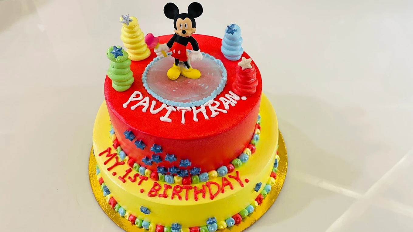 Mickey Mouse themed two-tier birthday cake